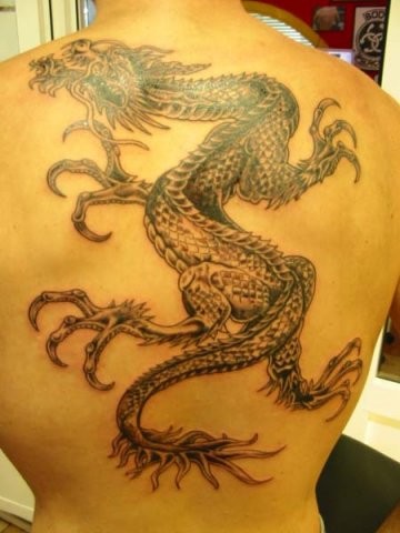 dragon back tattoo. big ack tattoo dragon