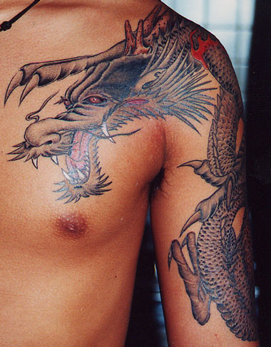 Dragon Tattoo Around The Arm. dragon tattoo design