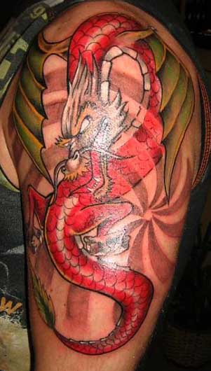 This is my very first, and for now my only tattoo. Arm red dragon tattoo.
